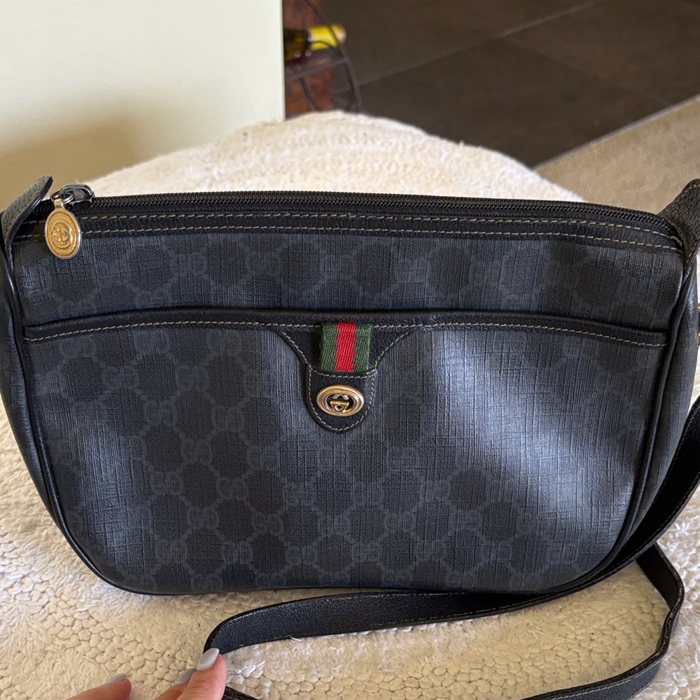 Gucci Black Shoulder Bag with Gold Emblem. Authentic
